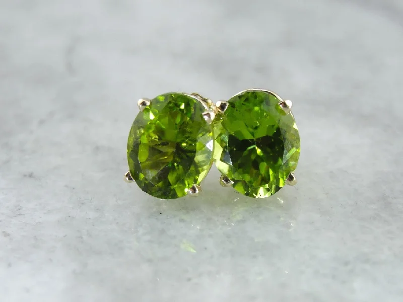 Large Oval Peridot Stud Earrings in Yellow Gold