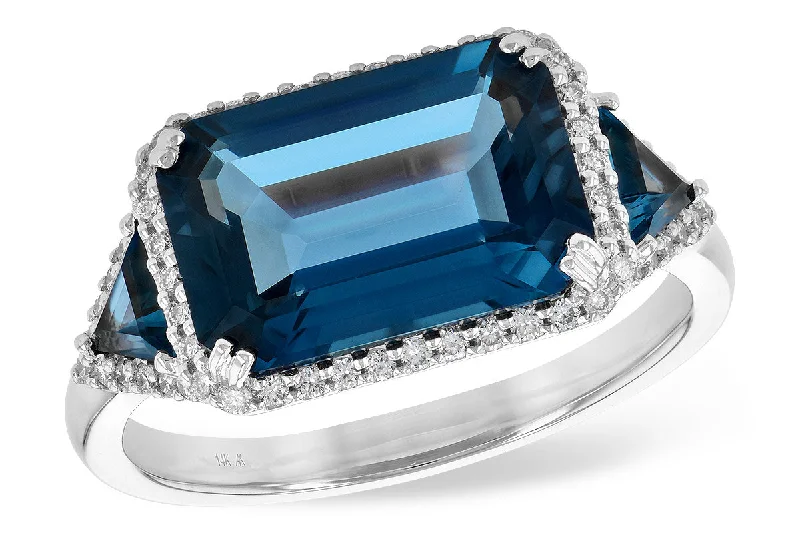 14K White Gold 4.82ctw London Blue Topaz & Diamond Halo Three Stone Ring by Allison Kaufman