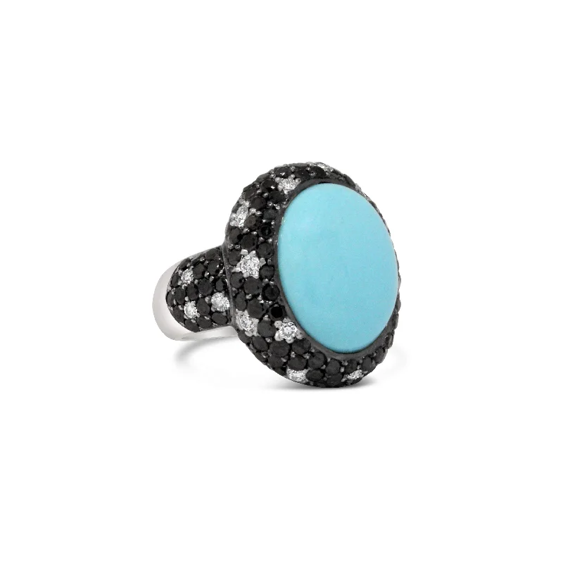 18KT WHITE GOLD TURQUOISE AND DIAMOND RING.