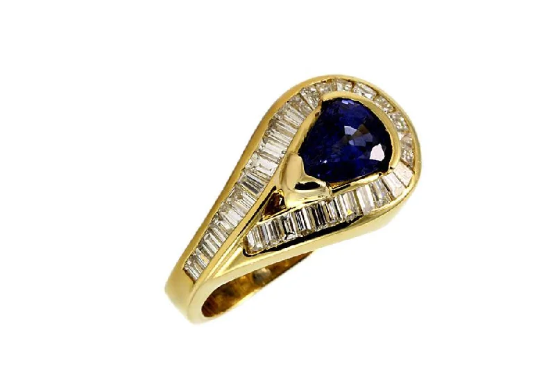 18KT YELLOW GOLD CHARLES KRYPELL SAPPHIRE RING.