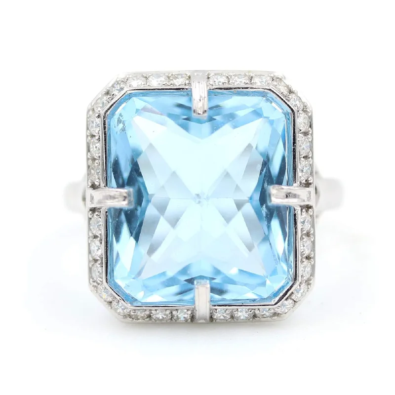 Blue Topaz And Diamond Ring