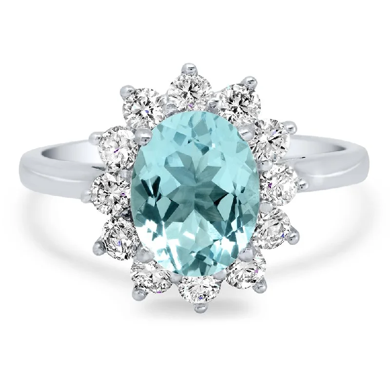 Oval Aquamarine and Diamond Halo Engagement Ring