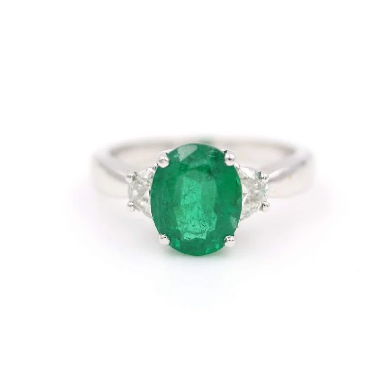 Oval Emerald And Diamond Ring