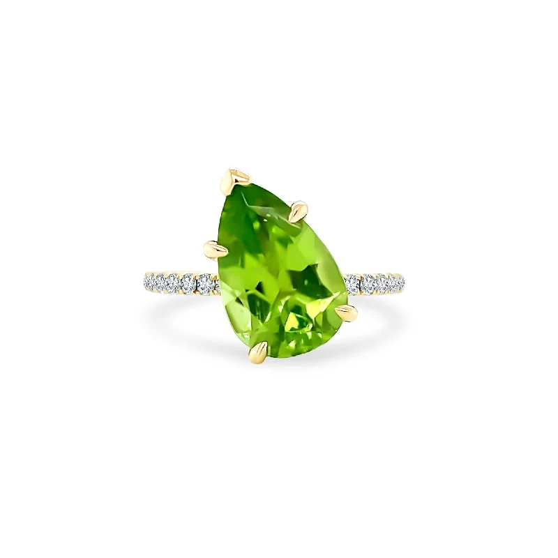 Offset Pear Cut Peridot Solitaire on Diamond Band