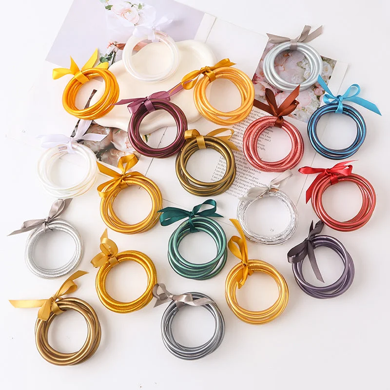 Wholesale PVC Silicone Tube Gold Foil Bracelet